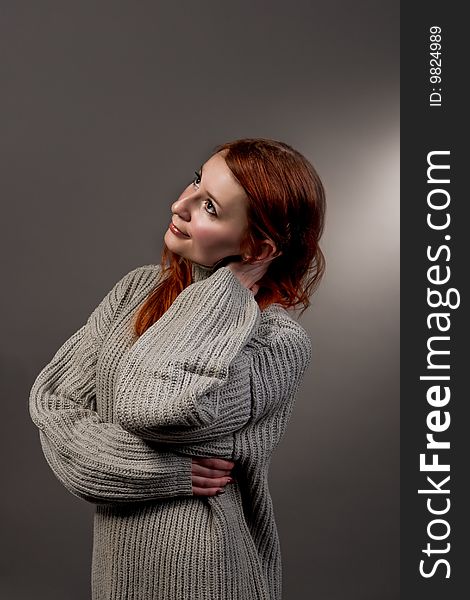 Looking up red haired girl smiling isolated