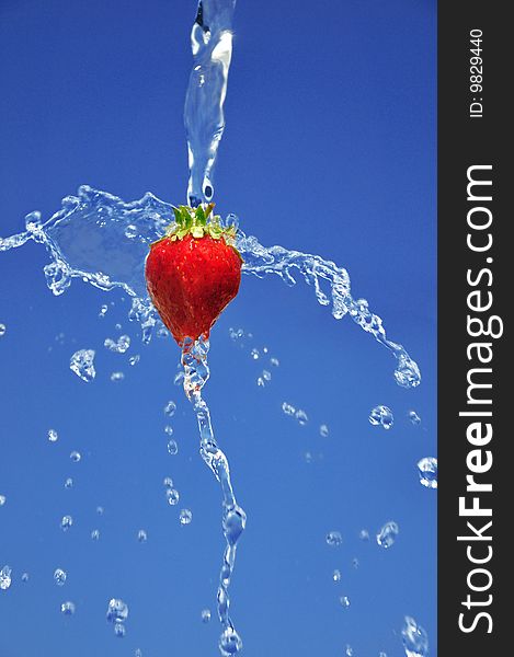 Strawberry in water against the sky