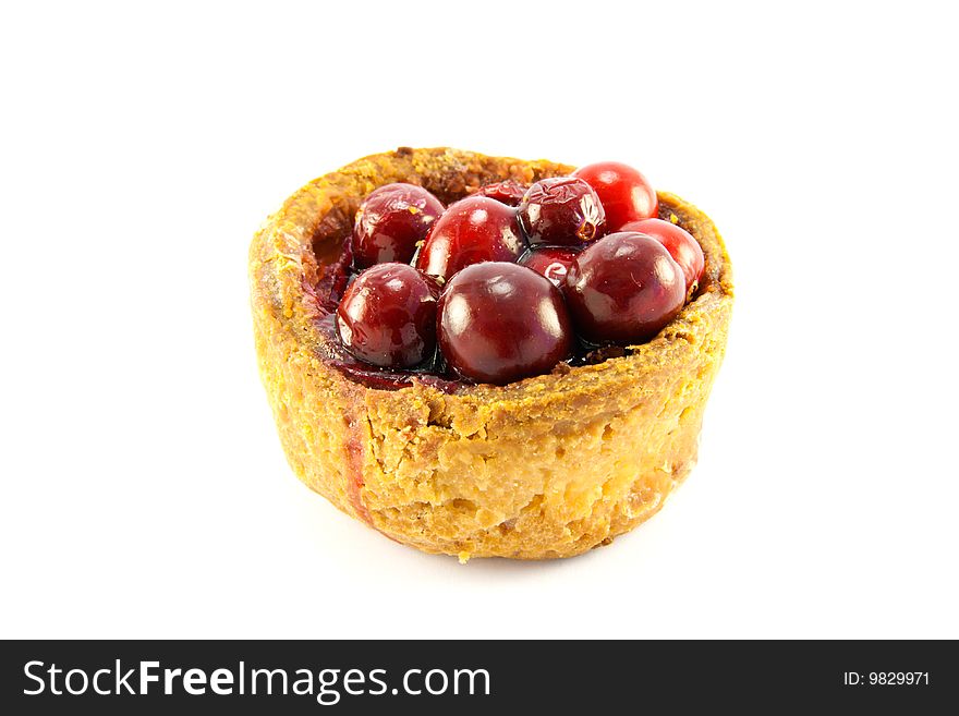 Single pork pie with cranberries on the top with clipping path on a white background
