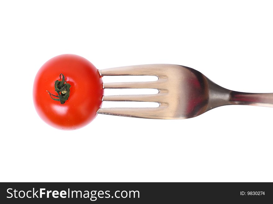 Detail of tomato with fork