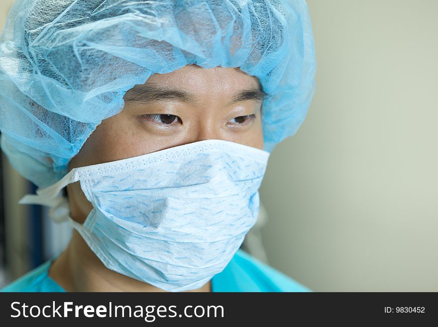 An Asian Doctor Working in a Hospital