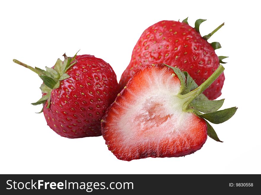 The fresh strawberry is isolated on a white background