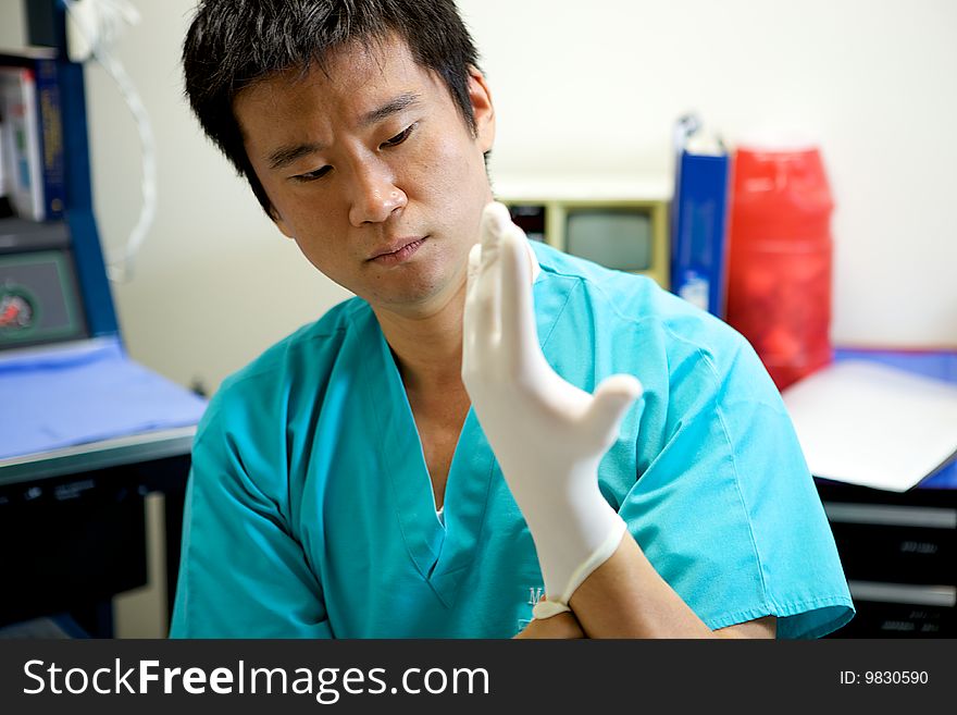 An Asian Doctor Working in a Hospital