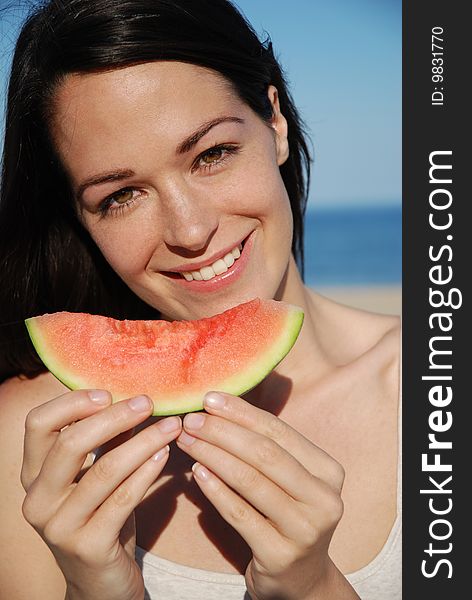 Woman holding fresh slice of watermelon. Woman holding fresh slice of watermelon