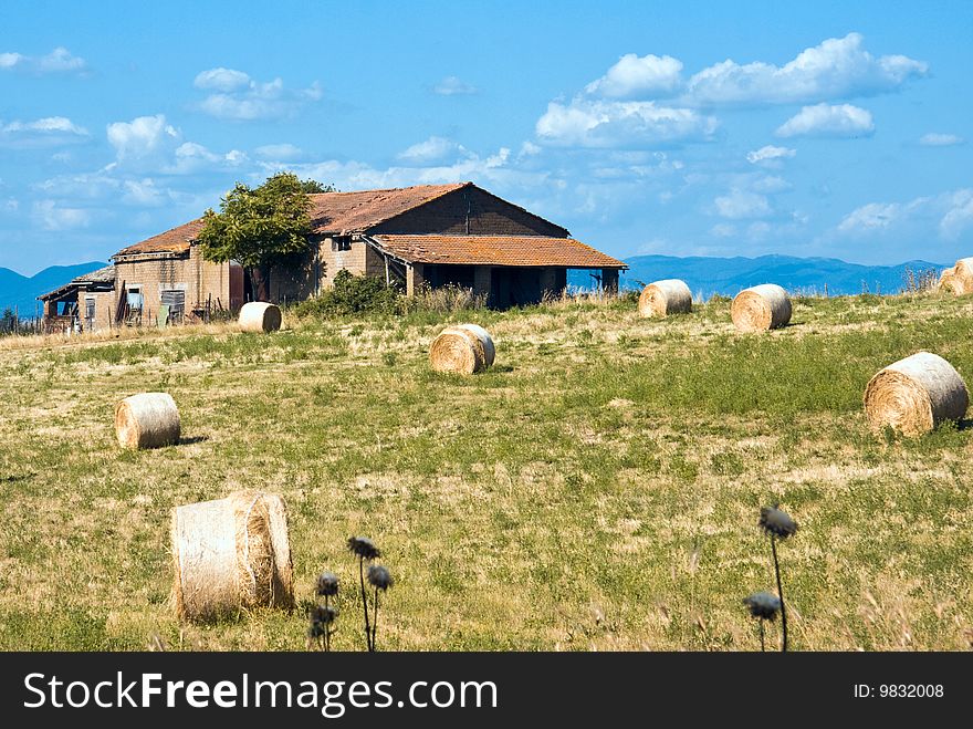 Bales of hay arount the farm