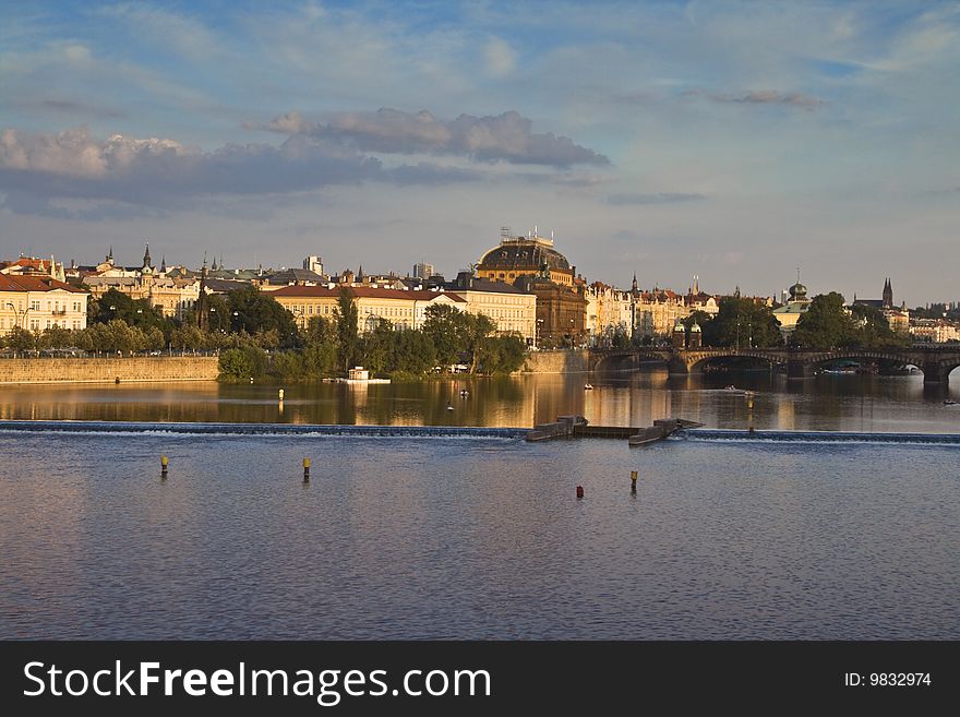 Dusk view of Prague from Charles bridge over the Vltava river. Dusk view of Prague from Charles bridge over the Vltava river.