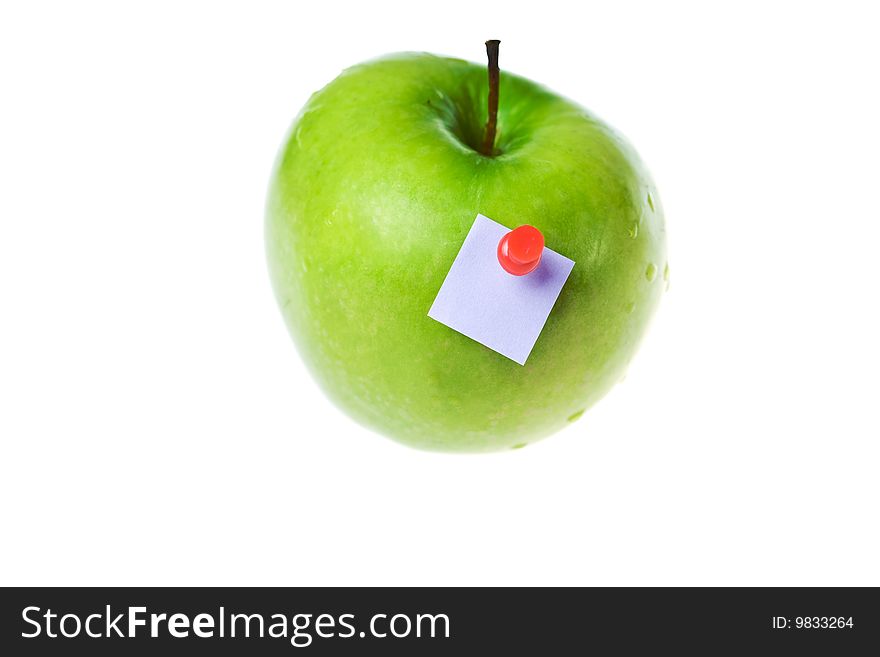 Green apple with paper stick. Green apple with paper stick