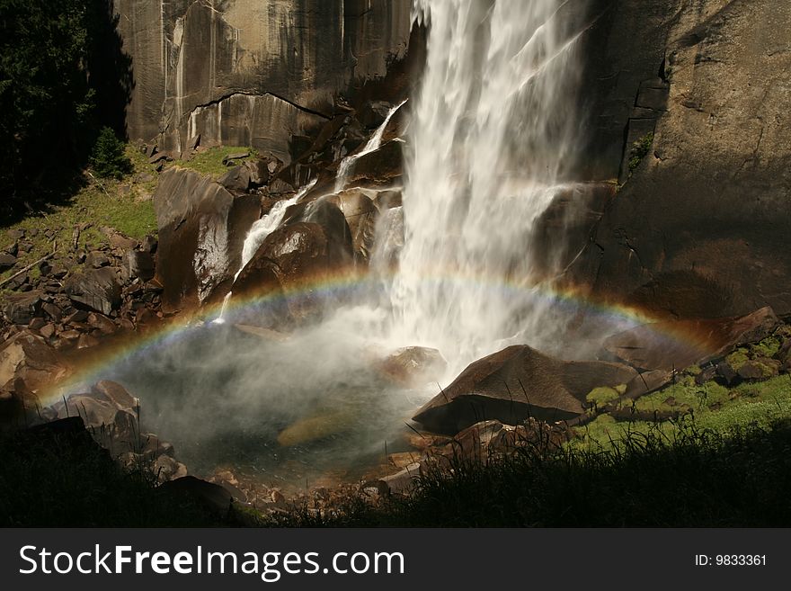 Shot of a rainbow at the base of Vernal Fall, Yosemite National Park, California. Shot of a rainbow at the base of Vernal Fall, Yosemite National Park, California