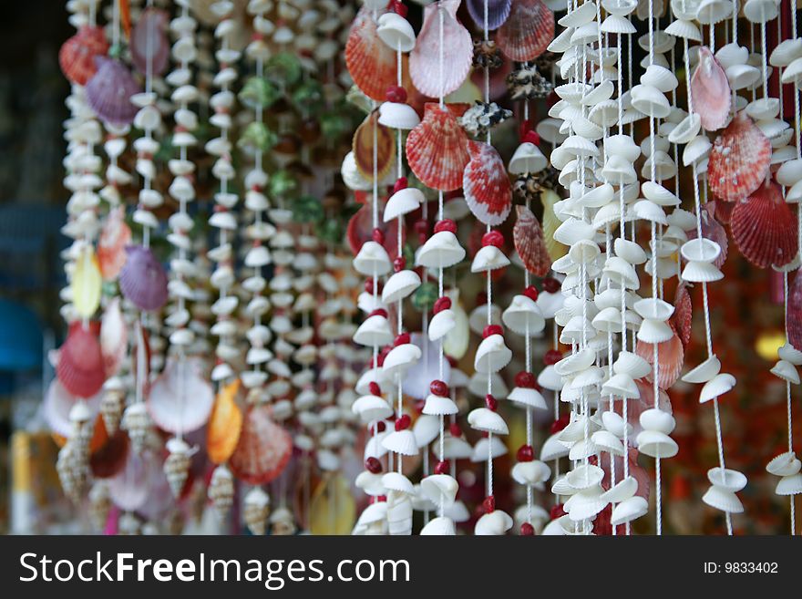 Shelled curtain is a famous souvenir of tropical beach steet market, Thailand