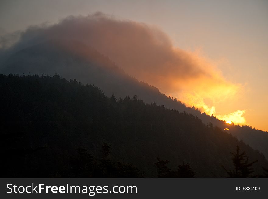 Clouds Rolling Over Morning Mountain