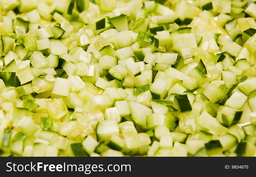 Finely chopped cucumber salad, background. Finely chopped cucumber salad, background