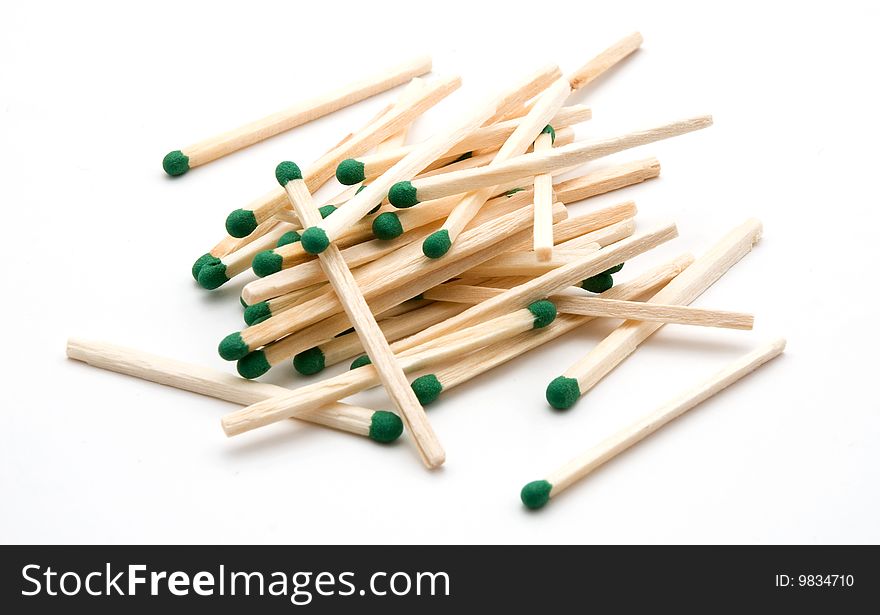 A pile of matches with a green sulfur