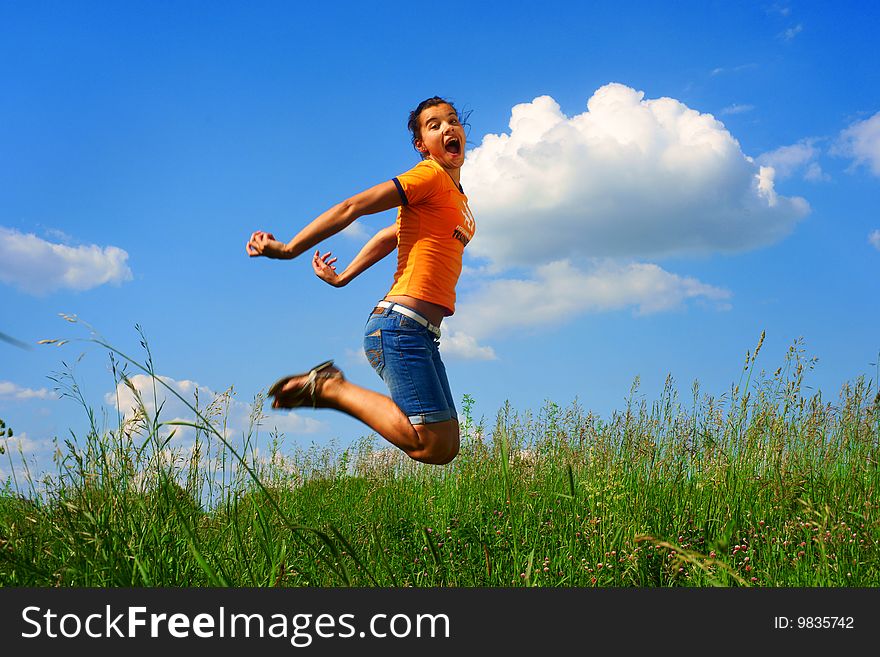 Happy young beautiful woman jumping. Happy young beautiful woman jumping