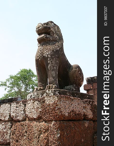 A lion sculpture in an Angkor temple. A lion sculpture in an Angkor temple