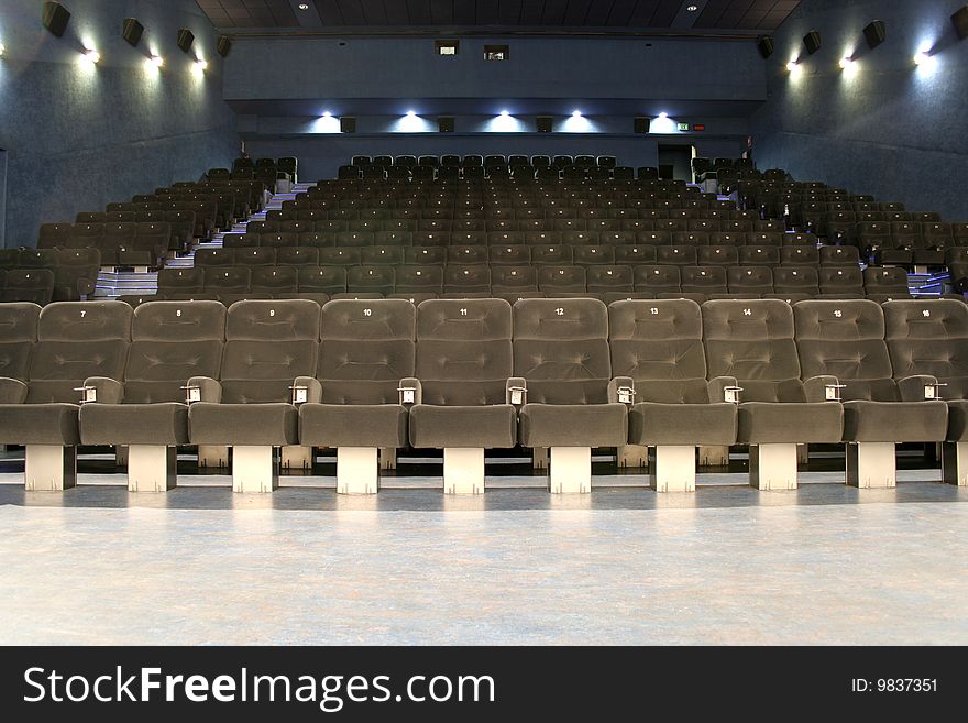 Theater chairs, empty seats beforeafter the show. Theater chairs, empty seats beforeafter the show.