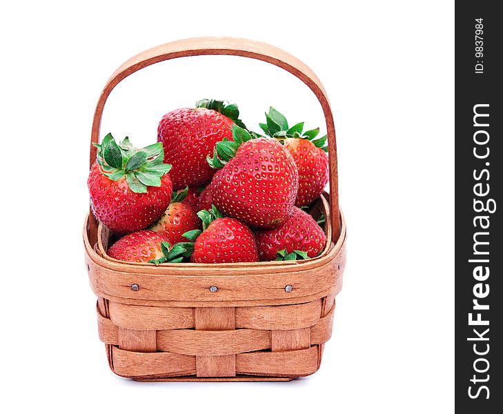 A small basket of fresh strawberries. A small basket of fresh strawberries.