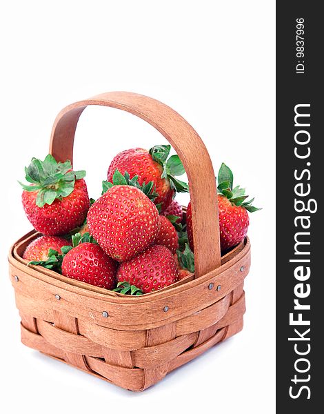 A small basket of fresh strawberries. A small basket of fresh strawberries.