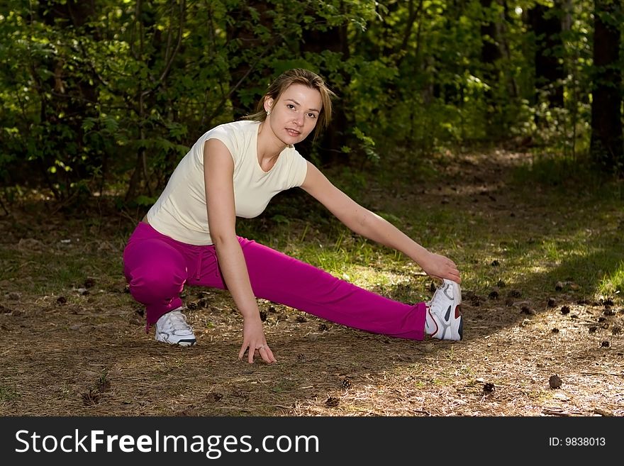 Active blonde woman in park. Active blonde woman in park