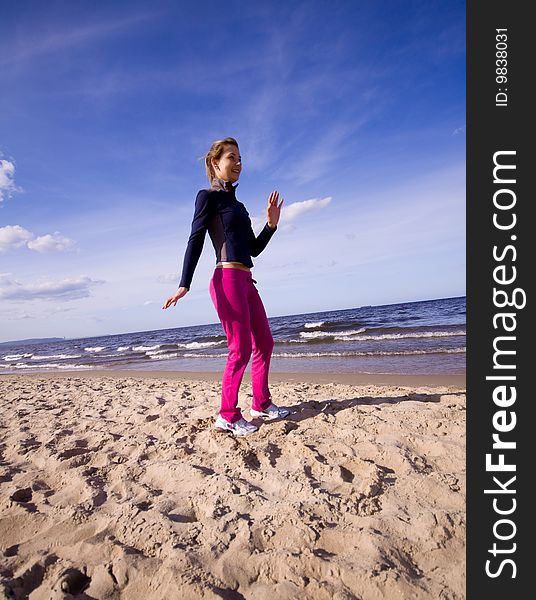 Active woman running on the beach. Active woman running on the beach