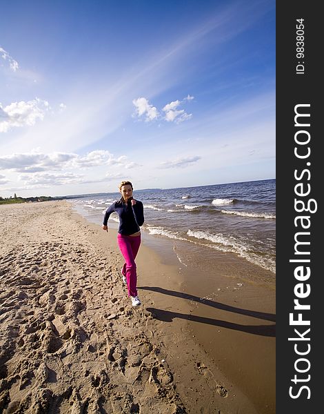 Active Woman On The Beach