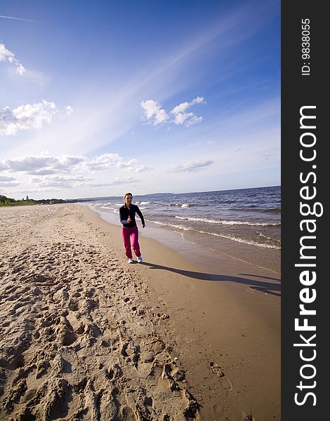 Active woman on the beach