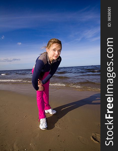 Active woman on the beach