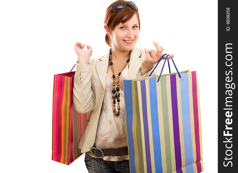 Young brunette woman with shopping bags. Young brunette woman with shopping bags