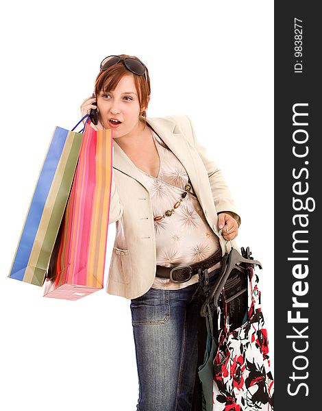 Young brunette woman with shopping bags. Young brunette woman with shopping bags