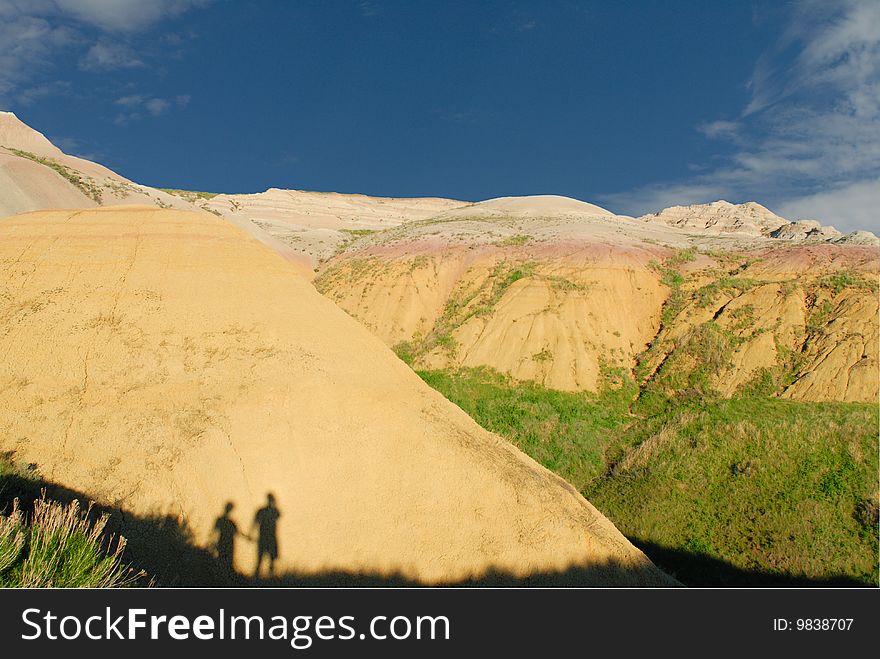 Shadow of two travelers at Badlands Nation Park. Shadow of two travelers at Badlands Nation Park