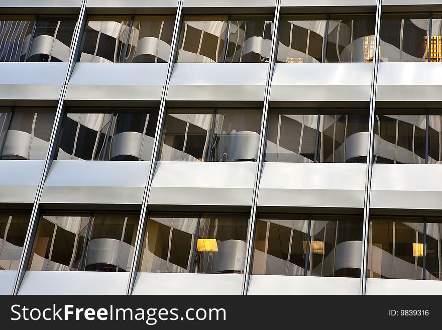 Image of a corporate building with blue tinted windows