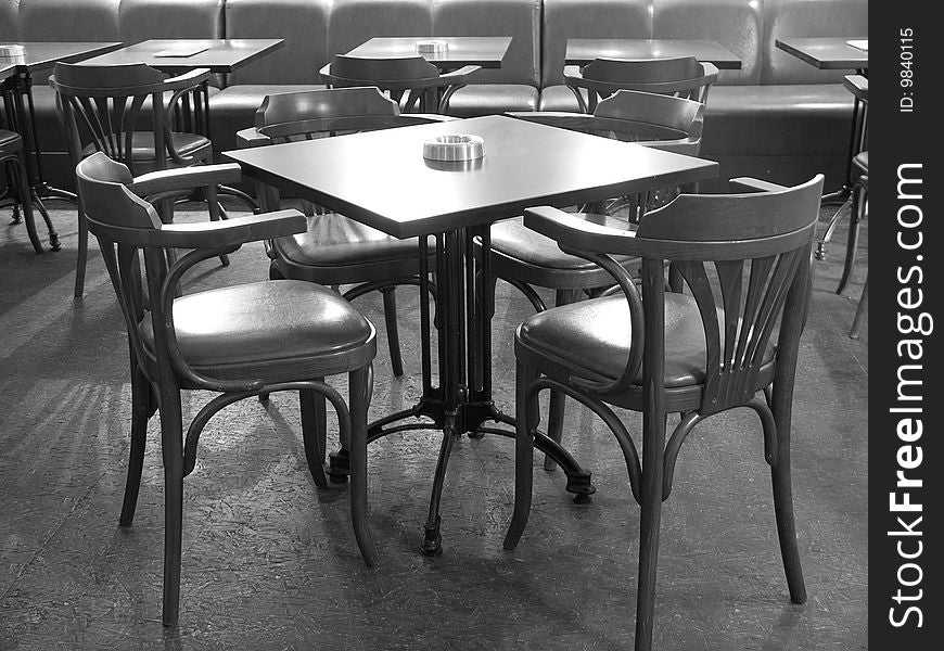 Cafe interior with wood tables and chairs