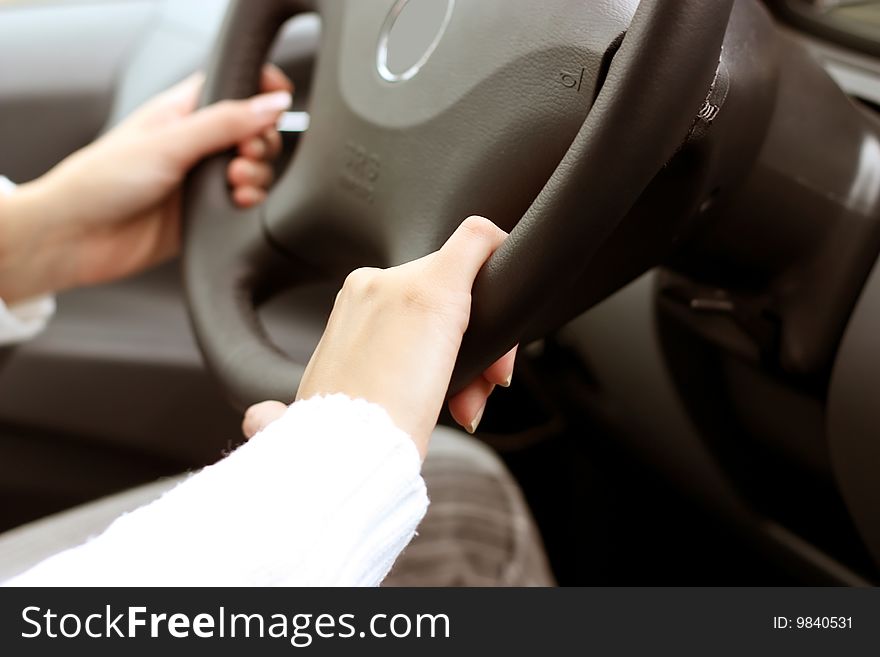 Female hands on car wheel. Female hands on car wheel
