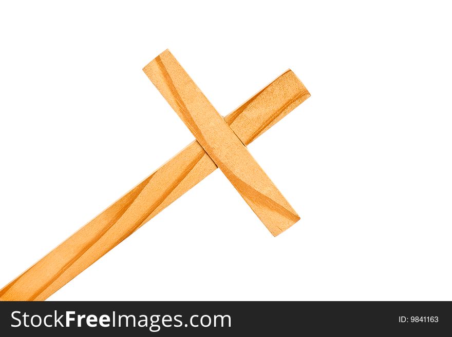 A wooden cross with white background.