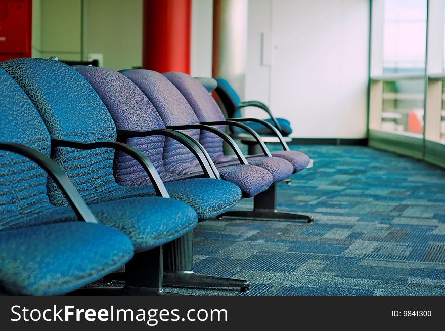 Seats in the passenger lounge of an airport. Seats in the passenger lounge of an airport