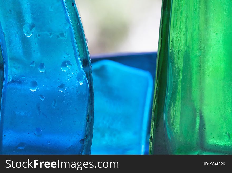 Close up of green and blue bottles. Close up of green and blue bottles