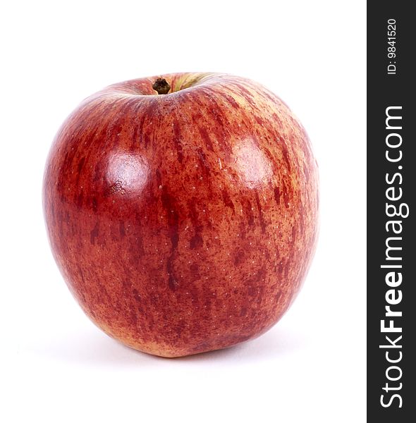 Healthy red apple on a white background