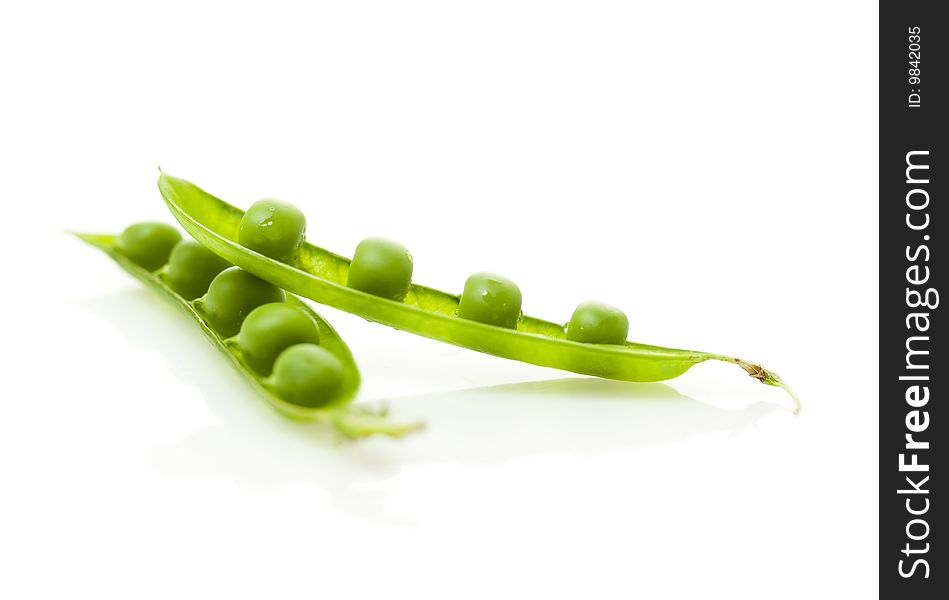 Peas in the pod isolated on white