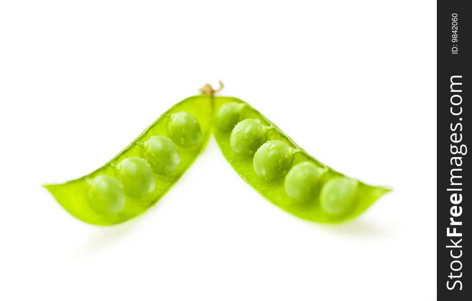Peas in the pod isolated on white