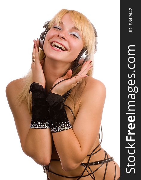 Portrait of a young beautiful girl topless crocked cables and headphones. Portrait of a young beautiful girl topless crocked cables and headphones