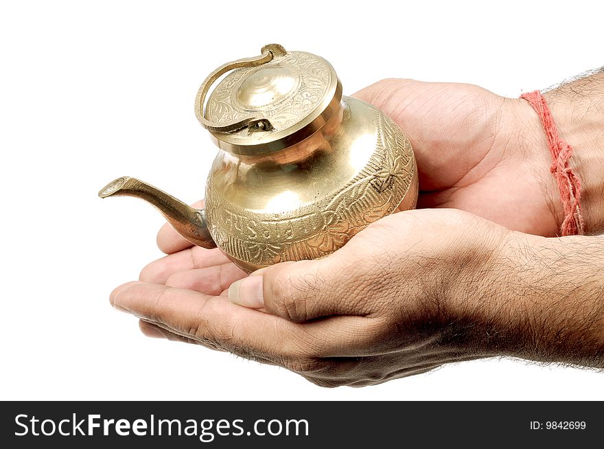 Holy vessel in hands isolated in white background.