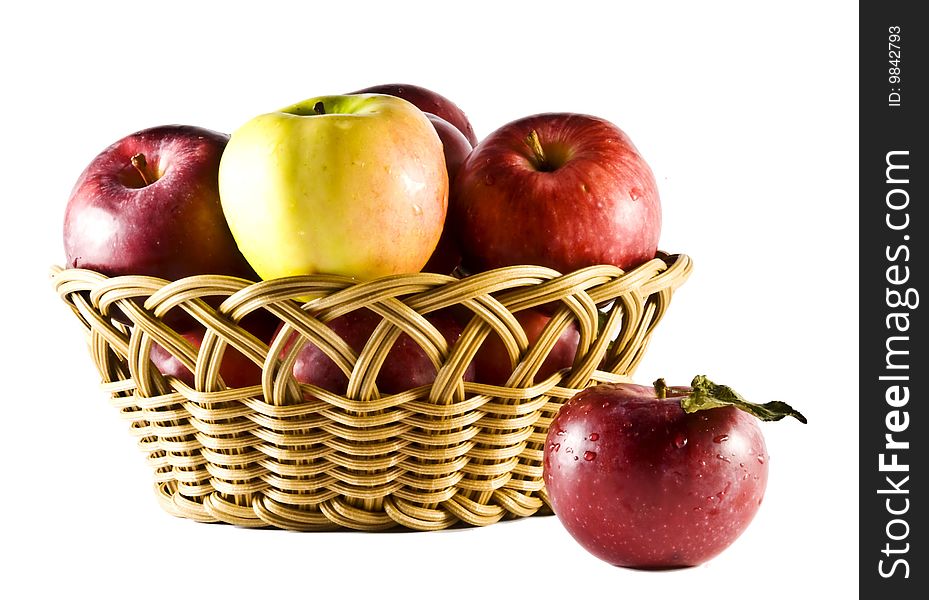 Basket of apples on a white background. Basket of apples on a white background