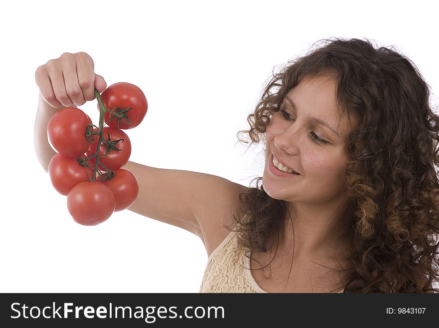 Pretty girl with tomatoes isloated on white background. Pretty smiling woman holding branch of red tomatoes. Beautiful young housewife with fresh vegetables. Pretty girl with tomatoes isloated on white background. Pretty smiling woman holding branch of red tomatoes. Beautiful young housewife with fresh vegetables