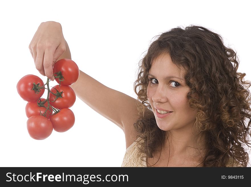 Pretty smiling girl holding branch of red tomatoes. Isolated over white background. Beautiful young woman with fresh vegetables. Pretty smiling girl holding branch of red tomatoes. Isolated over white background. Beautiful young woman with fresh vegetables.