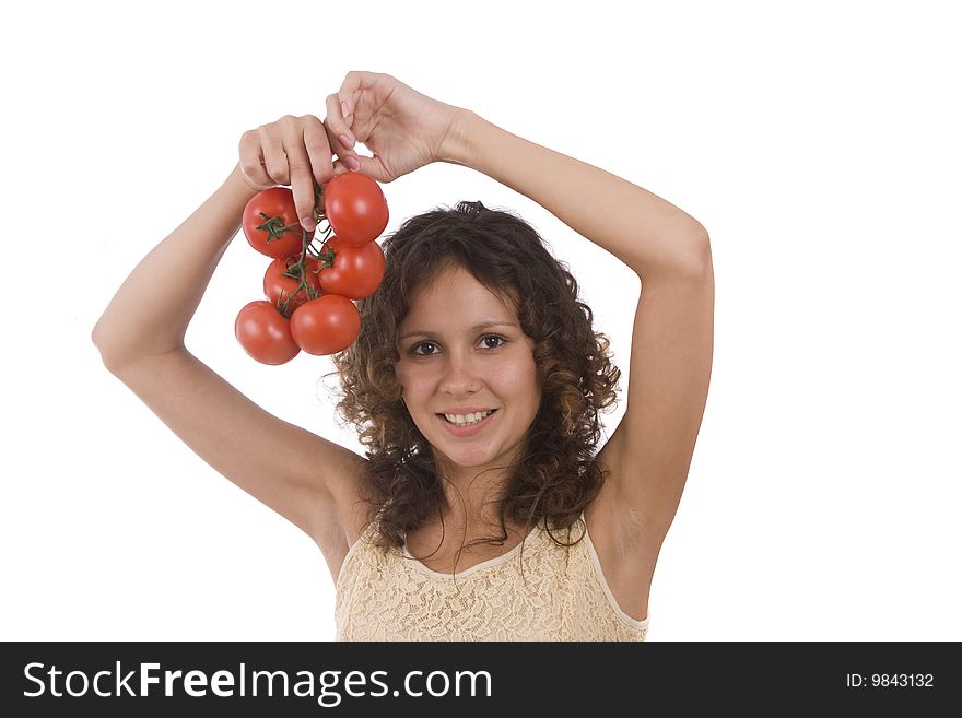 Pretty smiling woman holding branch of red tomatoes. Isolated over white background. Beautiful girl with fresh vegetables. Pretty smiling woman holding branch of red tomatoes. Isolated over white background. Beautiful girl with fresh vegetables