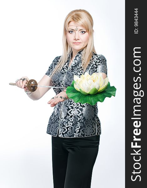 Woman with katana and lotus flower, isolated on white background