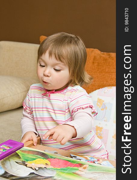 Sweet toddler baby girl playing puzzle. Sweet toddler baby girl playing puzzle