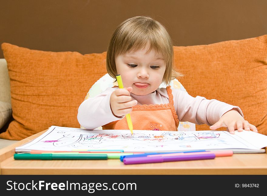 Sweet toddler baby girl drawing