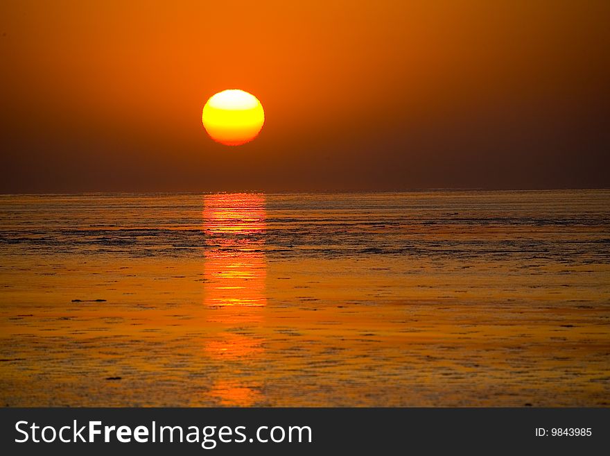 The sea was in the sky and the sun is shining with the golden sea. The sea was in the sky and the sun is shining with the golden sea