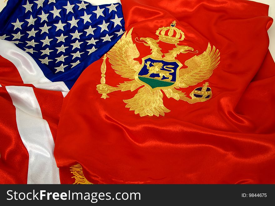 Details  on American and Montenegro flags. Details  on American and Montenegro flags