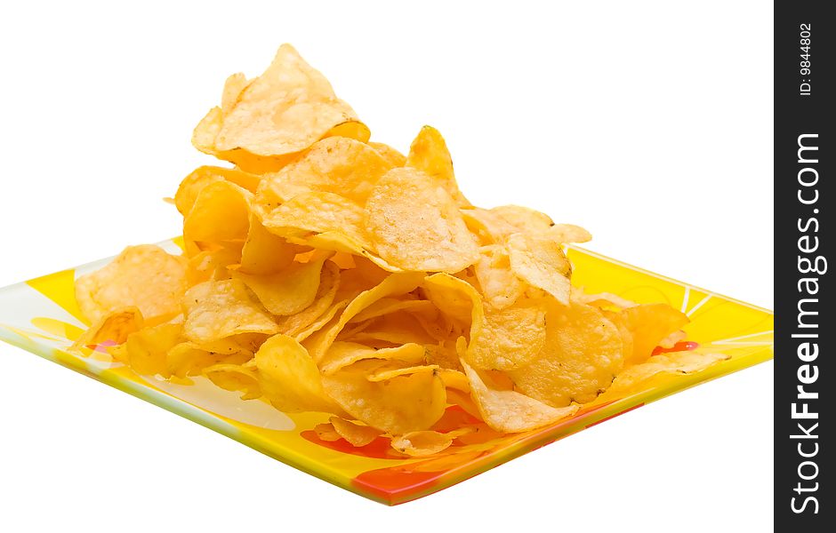 Close-up potato chips on plate isolated on white